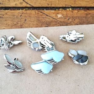 3 pair clip on earrings. One is trifari